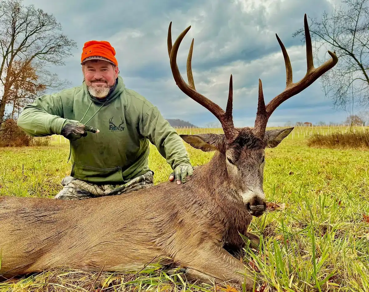 A trophy Ohio whitetail buck taken during the rut on a guided hunt
